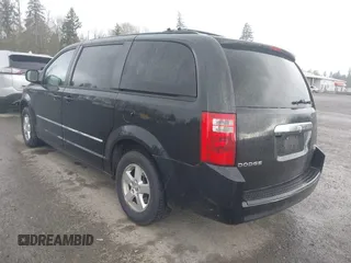 2009 Dodge Grand Caravan SXT with VIN 2D8HN54119R569142, listed as a IAAI auction lot 42000421 with 161,717 mi miles and . Bid and sale history available at DreamBid. Image 3.