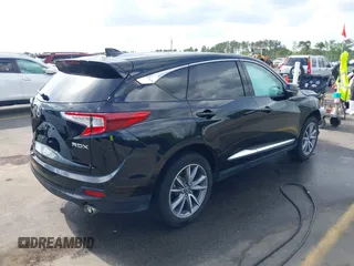 2020 Acura RDX w/Technology Pkg with VIN 5J8TC1H57LL002097, listed as a IAAI auction lot 41957752 with 60,945 mi miles. Bid and sale history available at carsss.com. Image 4.
