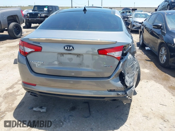 2013 Kia Optima SX with VIN 5XXGR4A67DG199714, listed as a IAAI auction lot 42359527 with 133,636 mi miles and . Bid and sale history available at DreamBid. Image 16.