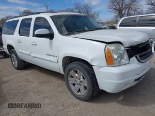 2007 GMC Yukon XL SLT with VIN 1GKFK16387J201973, listed as a IAAI auction lot 41879003 with 225,518 mi miles. Bid and sale history available at carsss.com. Image 1.