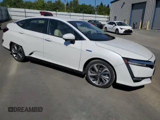 2021 Honda Clarity Touring z VIN JHMZC5F31MC001450, wystawiony jako Copart lot #55532565 z przebiegiem 14 873 mil mil oraz Szkoda całkowita • Salvage title. Historia ofert i sprzedaży dostępna na DreamBid. Obrazek 4.