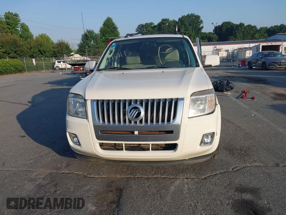 2011 Mercury Mariner Premier with VIN 4M2CN8HG0BKJ02401, listed as a IAAI auction lot 42579483 with 126,276 mi miles and . Bid and sale history available at DreamBid. Image 12.