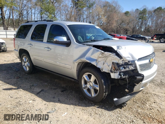 2013 Chevrolet Tahoe LTZ with VIN 1GNSCCE03DR374265, listed as a Copart auction lot 49290765 with 206,584 mi miles and Salvage title. Bid and sale history available at DreamBid. Image 4.