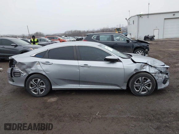 2018 Honda Civic LX with VIN 2HGFC2F56JH585343, listed as a IAAI auction lot 41558691 with 123,838 mi miles. Bid and sale history available at carsss.com. Image 14.