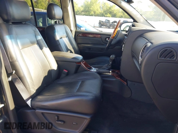 2006 GMC Envoy Denali with VIN 1GKET63M462257064, listed as a IAAI auction lot 40793921 with 179,304 mi miles. Bid and sale history available at carsss.com. Image 5.