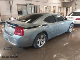 2006 Dodge Charger with VIN 2B3KA43G96H260361, listed as a IAAI auction lot 41907467 with 157,231 mi miles. Bid and sale history available at carsss.com. Image 4.