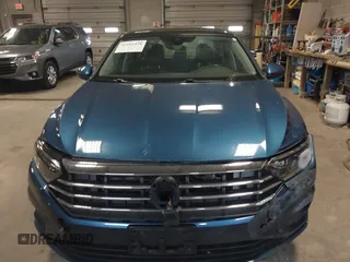 2019 Volkswagen Jetta SEL z VIN 3VWE57BU2KM116717, wystawiony jako IAAI lot #41951428 z przebiegiem 85 791 mil mil oraz . Historia ofert i sprzedaży dostępna na DreamBid. Obrazek 12.