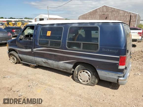 2001 Ford Econoline Cargo with VIN 1FDRE14W41HB55470, listed as a Copart auction lot 64990214 with 176,643 mi miles and Clean Title. Bid and sale history available at DreamBid. Image 2.