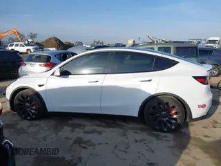 2023 Tesla Model Y Performance with VIN 7SAYGDEF0PF839468, listed as a IAAI auction lot 41609263 with 25,434 mi miles and . Bid and sale history available at DreamBid. Image 15.