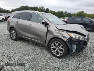 2016 Kia Sorento SXL with VIN 5XYPK4A14GG059158, listed as a Copart auction lot 72459954 with 264,218 mi miles and Salvage Title. Bid and sale history available at carsss.com. Image 4.