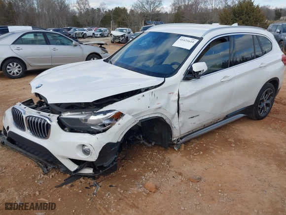2018 BMW X1 sDrive28i with VIN WBXHU7C37J5H39401, listed as a IAAI auction lot 41421610 with 94,576 mi miles. Bid and sale history available at carsss.com. Image 18.