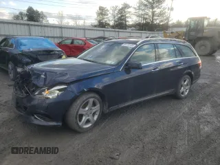 2015 Mercedes-Benz E 350 Luxury with VIN WDDHH8JB0FB099187, listed as a Copart auction lot 85170104 with 124,036 mi miles and Salvage title. Bid and sale history available at DreamBid. Image 1.