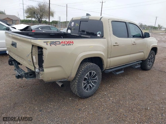 2020 Toyota Tacoma 4WD SR5 with VIN 5TFCZ5AN7LX239020, listed as a IAAI auction lot 41320072 with 69,583 mi miles. Bid and sale history available at carsss.com. Image 4.