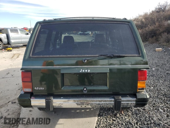 1995 Jeep Cherokee with VIN 1J4FN78SXSL617511, listed as a Copart auction lot 44650885 with 42,598 mi miles and Salvage title. Bid and sale history available at DreamBid. Image 6.