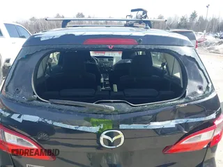 2014 Mazda 5 Sport with VIN JM1CW2BL5E0167153, listed as a IAAI auction lot 41790276 with 243,565 mi miles. Bid and sale history available at carsss.com. Image 6.