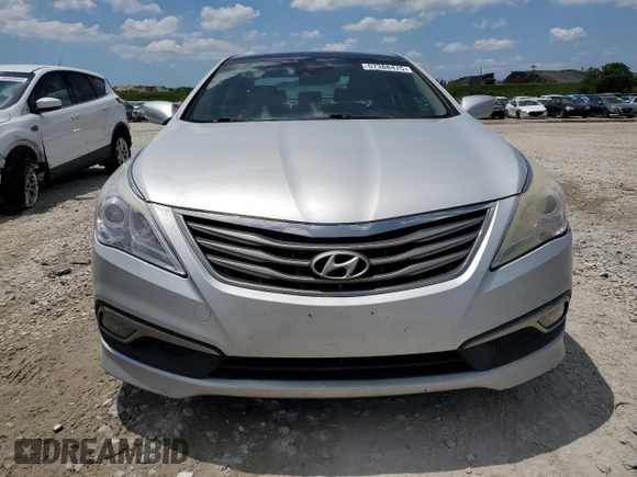 2015 Hyundai Azera Limited z VIN KMHFH4JG1FA474978, wystawiony jako Copart lot #57388475 z przebiegiem 172 437 mil mil oraz Czysty tytuł • Clean title. Historia ofert i sprzedaży dostępna na DreamBid. Obrazek 5.