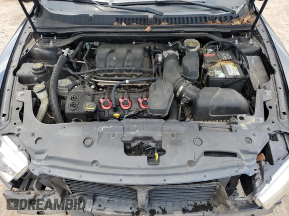 2013 Ford Taurus Limited with VIN 1FAHP2F84DG136769, listed as a Copart auction lot 60990765 with 228,994 mi miles and Salvage title. Bid and sale history available at DreamBid. Image 11.