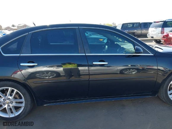 2013 Chevrolet Impala LTZ with VIN 2G1WC5E3XD1208357, listed as a IAAI auction lot 42053811 with 376,518 mi miles. Bid and sale history available at carsss.com. Image 13.