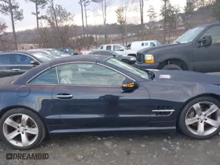 2009 Mercedes-Benz SL-Class V8 with VIN WDBSK71F29F143653, listed as a IAAI auction lot 41310556 with 115,377 mi miles. Bid and sale history available at carsss.com. Image 13.