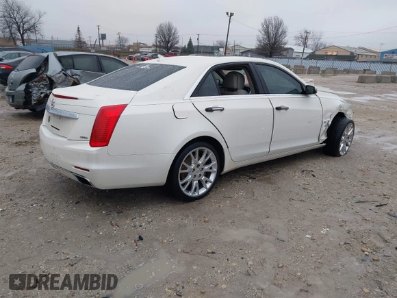 2014 Cadillac CTS Luxury AWD with VIN 1G6AX5S33E0156239, listed as a IAAI auction lot 41452922 with Not Provided miles and . Bid and sale history available at DreamBid. Image 4.