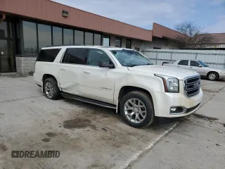 2015 GMC Yukon XL SLT with VIN 1GKS2HKC8FR259966, listed as a Copart auction lot 50410195 with 158,367 mi miles and Salvage Title. Bid and sale history available at carsss.com. Image 4.