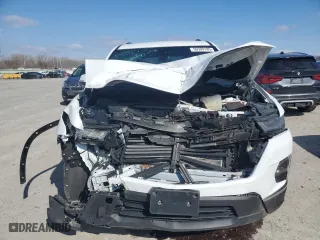 2023 Chevrolet Traverse LT Leather with VIN 1GNEVHKWXPJ231359, listed as a Copart auction lot 50389185 with 33,489 mi miles and Salvage Title. Bid and sale history available at carsss.com. Image 5.