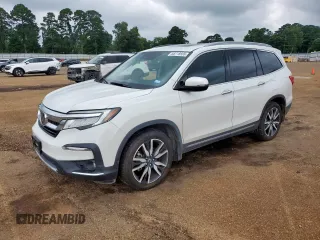 2022 Honda Pilot Touring 7-Passenger with VIN 5FNYF5H67NB013506, listed as a Copart auction lot 58718565 with 47,072 mi miles and Salvage title. Bid and sale history available at DreamBid. Image 1.