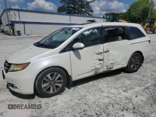 2015 Honda Odyssey Touring Elite with VIN 5FNRL5H97FB122931, listed as a Copart auction lot 55315665 with 208,311 mi miles and Salvage title. Bid and sale history available at DreamBid. Image 1.