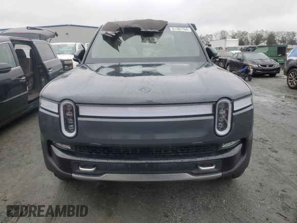2022 Rivian R1T Adventure z VIN 7FCTGAAA5NN014020, wystawiony jako Copart lot #81367764 z przebiegiem Nie podano mil oraz Szkody całkowita. Historia ofert i sprzedaży dostępna na DreamBid. Obrazek 5.