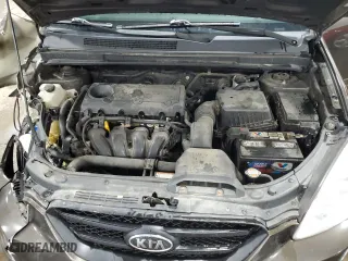 2009 Kia Rondo LX Base with VIN KNAFG528397269679, listed as a Copart auction lot 64802864 with 160,936 mi miles and Salvage Title. Bid and sale history available at carsss.com. Image 12.