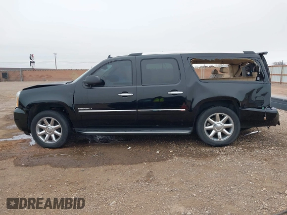 2014 GMC Yukon XL Denali with VIN 1GKS2MEF8ER239777, listed as a IAAI auction lot 41192009 with 142,656 mi miles. Bid and sale history available at carsss.com. Image 15.