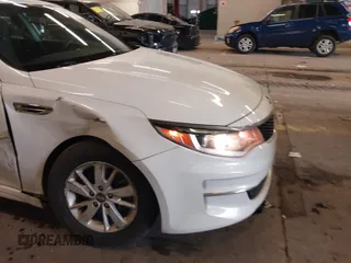 2016 Kia Optima LX with VIN 5XXGT4L31GG046321, listed as a IAAI auction lot 41847730 with 88,439 mi miles. Bid and sale history available at carsss.com. Image 6.