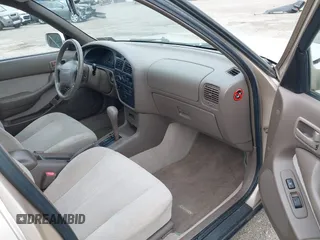 1996 Toyota Camry DX with VIN 4T1BG12K7TU813773, listed as a IAAI auction lot 42084977 with 49,453 mi miles. Bid and sale history available at carsss.com. Image 5.