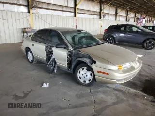 2002 Saturn SL z VIN 1G8ZH52842Z165459, wystawiony jako Copart lot #57273035 z przebiegiem 84 482 mil mil oraz Szkoda całkowita • Salvage title. Historia ofert i sprzedaży dostępna na DreamBid. Obrazek 4.
