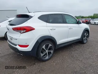 2016 Hyundai Tucson Limited with VIN KM8J33A23GU215481, listed as a IAAI auction lot 42202341 with 97,693 mi miles. Bid and sale history available at carsss.com. Image 4.