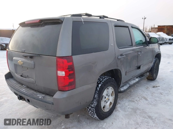 2013 Chevrolet Tahoe LT with VIN 1GNSKBE0XDR296094, listed as a IAAI auction lot 41448160 with 167,165 mi miles and . Bid and sale history available at DreamBid. Image 4.