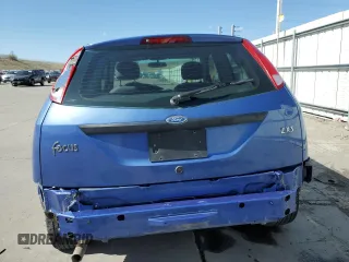 2004 Ford Focus ZX3 with VIN 3FAFP313X4R123879, listed as a Copart auction lot 54052055 with 174,692 mi miles and Salvage Title. Bid and sale history available at carsss.com. Image 6.