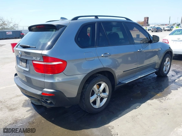 2009 BMW X5 30i with VIN 5UXFE43589L270405, listed as a IAAI auction lot 42084949 with 158,619 mi miles. Bid and sale history available at carsss.com. Image 4.
