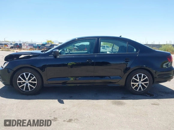 2016 Volkswagen Jetta Sedan 1.4T SE with VIN 3VWD67AJ8GM368642, listed as a IAAI auction lot 42087079 with 90,974 mi miles. Bid and sale history available at carsss.com. Image 14.