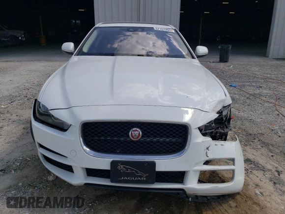 2017 Jaguar XE 25t z VIN SAJAR4BG1HA964691, wystawiony jako Copart lot #57151495 z przebiegiem 94 277 mil mil oraz Szkoda całkowita • Salvage title. Historia ofert i sprzedaży dostępna na DreamBid. Obrazek 5.