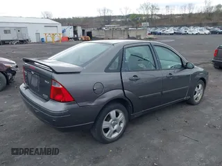 2006 Ford Focus S with VIN 1FAHP34NX6W234504, listed as a IAAI auction lot 42087837 with 142,265 mi miles and . Bid and sale history available at carsss.com. Image 4.