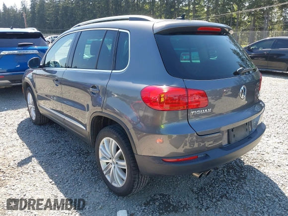 2013 Volkswagen Tiguan SEL with VIN WVGBV3AX1DW595673, listed as a IAAI auction lot 42140263 with 77,457 mi miles and . Bid and sale history available at DreamBid. Image 3.
