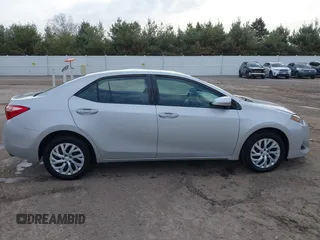 2019 Toyota Corolla L with VIN 5YFBURHE2KP934042, listed as a IAAI auction lot 41963491 with 87,299 mi miles. Bid and sale history available at carsss.com. Image 14.