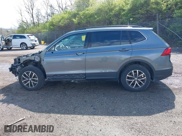 2019 Volkswagen Tiguan SE with VIN 3VV2B7AX5KM198454, listed as a IAAI auction lot 42033410 with 64,381 mi miles and . Bid and sale history available at DreamBid. Image 15.