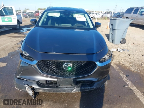 2022 Mazda CX-30 S Premium with VIN 3MVDMBDL0NM413867, listed as a IAAI auction lot 42082560 with 12,375 mi miles and . Bid and sale history available at DreamBid. Image 12.