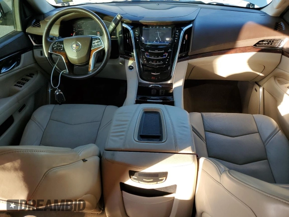 2015 Cadillac Escalade z VIN 1GYS4AKJ1FR100437, wystawiony jako Copart lot #78578004 z przebiegiem 51 574 mil mil oraz Czysty tytuł • Clean title. Historia ofert i sprzedaży dostępna na DreamBid. Obrazek 8.