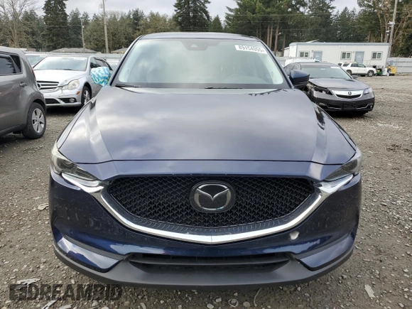 2018 Mazda CX-5 Touring with VIN JM3KFACM8J1349356, listed as a Copart auction lot 89154055 with 82,719 mi miles and Salvage Title. Bid and sale history available at carsss.com. Image 5.