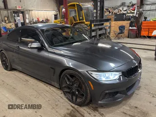 2014 BMW 4 Series 428i xDrive with VIN WBA3N5C56EF716258, listed as a Copart auction lot 52916185 with 106,512 mi miles and Salvage Title. Bid and sale history available at carsss.com. Image 1.