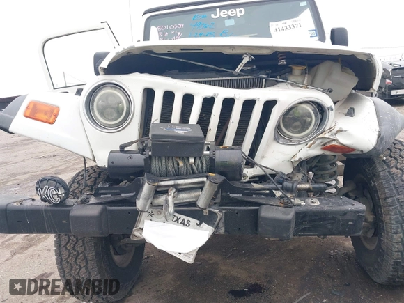 2005 Jeep Wrangler Sport with VIN 1J4FA49S25P320240, listed as a IAAI auction lot 41433371 with 144,552 mi miles. Bid and sale history available at carsss.com. Image 17.