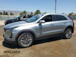 2024 Cadillac XT4 AWD Premium Luxury with VIN 1GYFZDR48RF153128, listed as a Copart auction lot 60712485 with 14,765 mi miles and Salvage title. Bid and sale history available at DreamBid. Image 1.